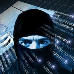 Hacker with black balaclava portrait