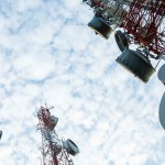 Telecommunication mast TV antennas with blue sky in the morning