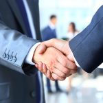 Two businessman shaking hands