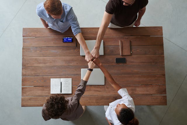 Photo by fauxels: https://www.pexels.com/photo/photo-of-people-doing-fist-bump-3184430/