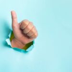 hand-showing-thumb-up-copyspace