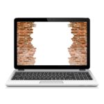 broken-brick-wall-modern-laptop-screen