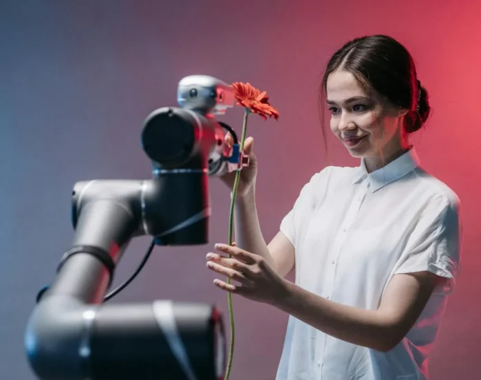 Photo by Pavel Danilyuk: https://www.pexels.com/photo/a-robot-holding-a-flower-8438968/